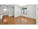 Dining room features wood flooring and a chandelier at 5331 W Mescal St, Glendale, AZ 85304