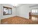 Bright dining room with hardwood floors and kitchen view at 5331 W Mescal St, Glendale, AZ 85304