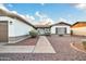 Front entry of a single-story home with walkway and landscaping at 5331 W Mescal St, Glendale, AZ 85304