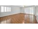 Bright living room with wood floors and sliding glass doors at 5331 W Mescal St, Glendale, AZ 85304