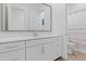 Elegant bathroom with white vanity, large mirror, and a shower-tub combination at 5724 S Coyote Cyn, Mesa, AZ 85212