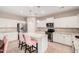 Modern kitchen with white cabinets, granite countertops and stainless steel appliances at 5836 S 58Th Gln, Laveen, AZ 85339