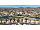 Wide aerial view of the community and mountains at 6282 W Rose Garden Ln, Glendale, AZ 85308