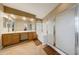 Elegant bathroom with double vanity and a large bathtub at 6282 W Rose Garden Ln, Glendale, AZ 85308