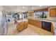 Open kitchen with island and views of Gathering room at 6282 W Rose Garden Ln, Glendale, AZ 85308