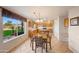 Bright kitchen with granite countertops and oak cabinets at 6282 W Rose Garden Ln, Glendale, AZ 85308