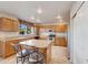 Kitchen boasts granite island and stainless steel appliances at 6282 W Rose Garden Ln, Glendale, AZ 85308