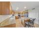 Granite kitchen island and oak cabinetry at 6282 W Rose Garden Ln, Glendale, AZ 85308