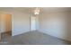 Spacious bedroom with carpet and ceiling fan at 645 S Warren Rd, Maricopa, AZ 85139