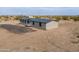 House with large yard and desert landscape at 645 S Warren Rd, Maricopa, AZ 85139