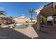 Inviting backyard oasis with a sparkling pool and patio at 6970 W Morning Dove Dr, Glendale, AZ 85308