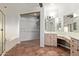 Bathroom features a large closet and a soaking tub at 6970 W Morning Dove Dr, Glendale, AZ 85308