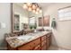 Elegant bathroom with double sinks and granite countertops at 7021 E Earll Dr # 213, Scottsdale, AZ 85251