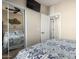 Bedroom with mirrored closet and ensuite bathroom access at 7021 E Earll Dr # 213, Scottsdale, AZ 85251