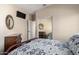 Well-lit bedroom with a dresser and mirrored closet doors at 7021 E Earll Dr # 213, Scottsdale, AZ 85251