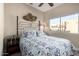 Bright bedroom with a comfortable queen bed and large window at 7021 E Earll Dr # 213, Scottsdale, AZ 85251