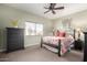 Cozy bedroom with a comfortable bed and plenty of storage at 7021 E Earll Dr # 213, Scottsdale, AZ 85251