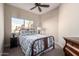 Charming bedroom with a full-size bed and window seat at 7021 E Earll Dr # 213, Scottsdale, AZ 85251