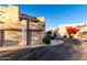 Building exterior with attached garages and landscaping at 7021 E Earll Dr # 213, Scottsdale, AZ 85251