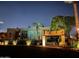 Night view of the community building and landscaping at 7021 E Earll Dr # 213, Scottsdale, AZ 85251