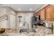 Kitchen with granite countertops and stainless steel appliances at 7021 E Earll Dr # 213, Scottsdale, AZ 85251