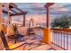 Covered patio with seating and sunset view at 7021 E Earll Dr # 213, Scottsdale, AZ 85251