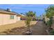 Landscaped backyard with desert plants and gravel at 7215 W Mclellan Rd, Glendale, AZ 85303