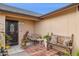 Inviting front porch with a sitting area, perfect for relaxing at 7215 W Mclellan Rd, Glendale, AZ 85303