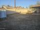 Large backyard with dirt and a storage shed at 7940 W Avalon Dr, Phoenix, AZ 85033