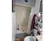 Small bathroom with shower stall, toilet and storage at 7940 W Avalon Dr, Phoenix, AZ 85033