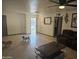 Spacious living room with tiled floors and lots of natural light at 7940 W Avalon Dr, Phoenix, AZ 85033