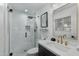 Stylish bathroom with gold fixtures and walk-in shower at 8314 E Clarendon Ave, Scottsdale, AZ 85251