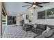 Relaxing patio with seating area, grill, and patterned tile floor at 8314 E Clarendon Ave, Scottsdale, AZ 85251