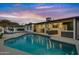 Inviting pool and spa area with stunning sunset views at 8314 E Clarendon Ave, Scottsdale, AZ 85251