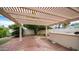 Relaxing brick patio covered by a pergola at 8514 E Fairmount Ave, Scottsdale, AZ 85251