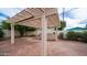 Brick patio with pergola and built-in BBQ area at 8514 E Fairmount Ave, Scottsdale, AZ 85251