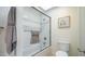 Updated bathroom with walk-in shower and tile flooring at 8514 E Fairmount Ave, Scottsdale, AZ 85251