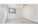 Bright bedroom with carpet flooring and a ceiling fan at 8514 E Fairmount Ave, Scottsdale, AZ 85251