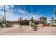 Single story home with a landscaped front yard, and two-car garage at 8514 E Fairmount Ave, Scottsdale, AZ 85251