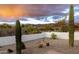 Beautiful backyard with desert landscaping and mountain views, creating a serene outdoor space at 9546 E Anasazi Pl, Gold Canyon, AZ 85118