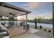 Covered patio with a built-in grill and seating area at 9546 E Anasazi Pl, Gold Canyon, AZ 85118