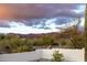 Picture-perfect backyard showcasing desert scenery and panoramic mountain views at 9546 E Anasazi Pl, Gold Canyon, AZ 85118