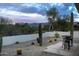 Backyard patio with seating area and mountain views at 9546 E Anasazi Pl, Gold Canyon, AZ 85118