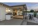 Covered patio with built-in grill and views of the desert landscape at 9546 E Anasazi Pl, Gold Canyon, AZ 85118