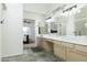 Large bathroom with double vanity and view of bedroom at 9546 E Anasazi Pl, Gold Canyon, AZ 85118