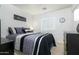 Bedroom with queen bed and dark wood furniture at 9546 E Anasazi Pl, Gold Canyon, AZ 85118