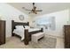 Spacious bedroom with large window and wooden furniture at 9546 E Anasazi Pl, Gold Canyon, AZ 85118