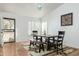 Charming dining area with wood table, bench and tile floor at 9546 E Anasazi Pl, Gold Canyon, AZ 85118