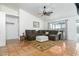 Living Room with sectional sofa and terracotta tile floor at 9546 E Anasazi Pl, Gold Canyon, AZ 85118