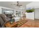 Living room with sectional sofa and access to the patio at 9546 E Anasazi Pl, Gold Canyon, AZ 85118